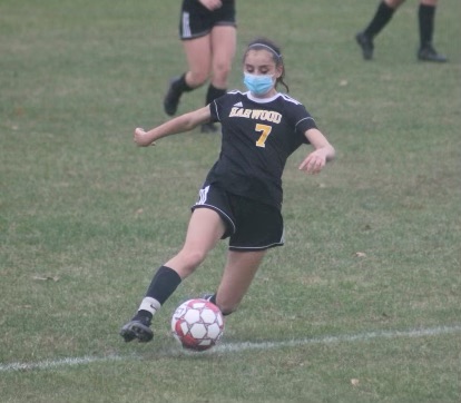 Lyric Smith, outside defender, plays the ball forward. Photo: Ellett Merriman